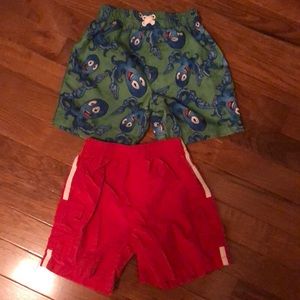 2 pairs of swim shorts. Size 18M